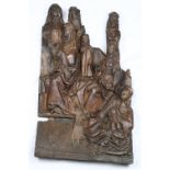 Continental post-Medieval carved wood plaque, depicting devotional figures above the Virgin Mary and