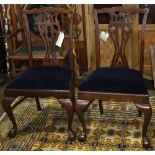 Pair of Chippendale style side chairs, having a pierced vasi form back splat, rising on cabriole