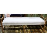 Louis XVI style bench, having scrolled carved ends, and rising on tapering fluted legs, 22"h x 64"