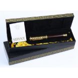 Gianni Versace "Crocodile Skin" fountain pen, the cap accented with gilt "crocodile skin", the