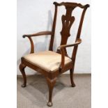 Chippendale walnut armchair, having a carved crestrail surmounting the pierced splat, the outswept