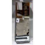 Moderne "Pablo" table mirror, the elongated rectangular glass rising on a stainless steel bracket,