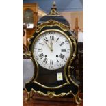 Louis XV style bracket clock, having a shaped ebonized case, with gilt metal mounts, the white