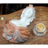 Italian style carved marble bust, depicting a beauty in period attire, rising on a circular base,