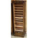 Arts and Crafts tambour file cabinet, the single tambour drawer case, having 10 document slots, 59"h