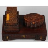 Chinese wooden desk ornament, with a stack of two book form boxes and a lobed box carved with