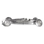 Chrome roadster sculpture, the race car depicting a stylized Bugatti, with race car driver,