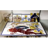 (lot of 12) Spanish majolica tiles, each polychrome decorated and depicting a lion and unicorn,