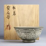 Japanese ceramic tea bowl, Korai celadon with floral motifs, the interior marked Zuisho on the bowl,