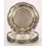 (lot of 8) German 800 silver charger plates, by Eugen Marcus, 19th century, having a foliate form