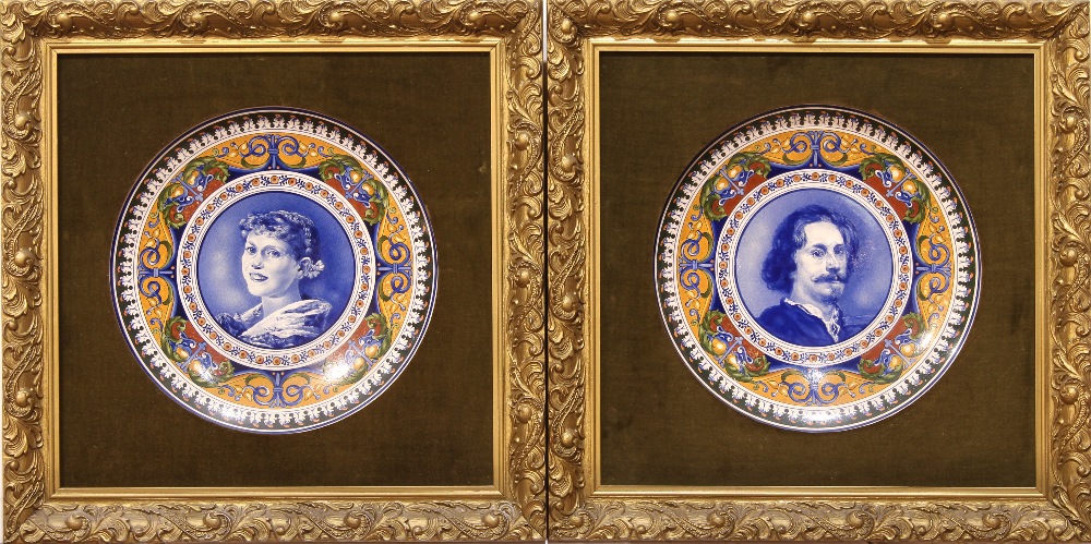 (lot of 2) Continental majolica cabinet plates, each centered with a portrait, one depicting a