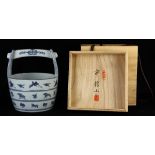 Japanese blue-and-white ceramic mizuoke pail, decorated with cranes, signed [Ho Kakuzan] on the