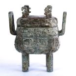 Chinese archaistic bronze lidded rectangular vessel, the body cast with taotie masks below a