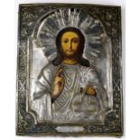 Russian icon, depicting Christ and having a silvered oklad, 9"h x 7"w