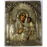 Russian icon, depicting the Mother of God, and having a brass oklad, 11"h x 9"w