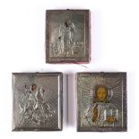 (lot of 3) Russian traveling icons, each having a silver oklad, one depicting Christ Pantocrator,