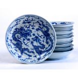 (lot of 10) Chinese underglazed blue porcelain dishes, each of two dragons in pursuit of a pearl,