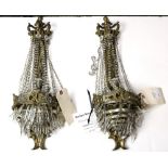 Pair of Neoclassical style bronze wall sconces, 20th Century, each single light fixture with