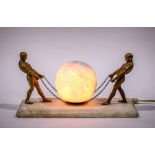 Art Deco style alabaster and enameled metal lamp, depicting two nude men preparing to lift the