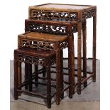 Set of four Chinese hardwood nesting tables, of graduated sizes, each with faux bamboo edge and