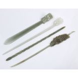 (lot of 4) Chinese hardstone hairpins: one as a twisted rod; two with floral motifs; the last,