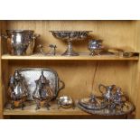 Two shelves of silver plate table articles including a lidded tureen, a footed compote, a serving