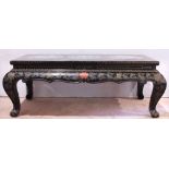 Chinese lacquered low table with cloisonne plaques, the top inset with three cloisonne roundels with