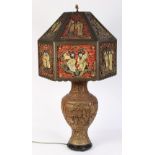 Chinese gilt cinnabar style vase, mounted as a lamp, featuring figural reserves with pavilions in