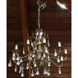 Rococo style brass ten light chandelier, approx 36"h x 24"w