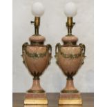 Pair of Neoclassical style bronze mounted marble table lamps, each having a single light above an