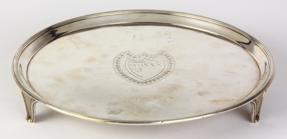 George III silver salver, London 1785, by Cronch and Hamach, the banded rim framing the chased