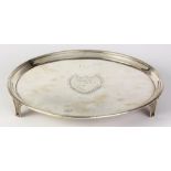 George III silver salver, London 1785, by Cronch and Hamach, the banded rim framing the chased