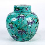 Chinese Dayazhai style porcelain lidded jar, of a bird perched on grape vines, and with peonies on a