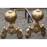 (lot of 2) English brass andirons, with a ball below an English lion's head, having a pierced mouth,