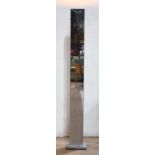 Italian Moderne style chrome floor lamp, having a rectangular form, and rising on a plinth base,