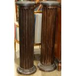 Pair of Neo-Classical style ebonized architectural doric pillars, 3'8''h