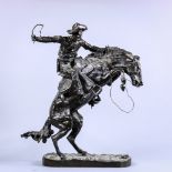 After Frederic Remington (American, 1861-1909), "The Bronco Buster," bronze sculpture, bears