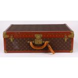 Louis Vuitton Azler hard shell suitcase, with signature monogrammed canvas body, continuous LV