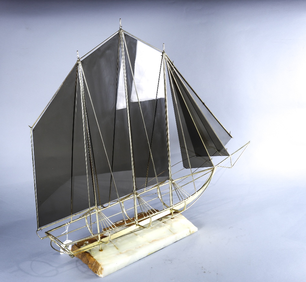 Mid century modern brass sail boat sculpture, the sails executed in smoked gray plastic, rising on a - Image 2 of 5