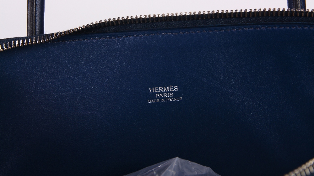 Hermes Clemence Bolide handbag, executed in navy, 35cm, with strap, lock, clochette, dust bag, - Image 6 of 7