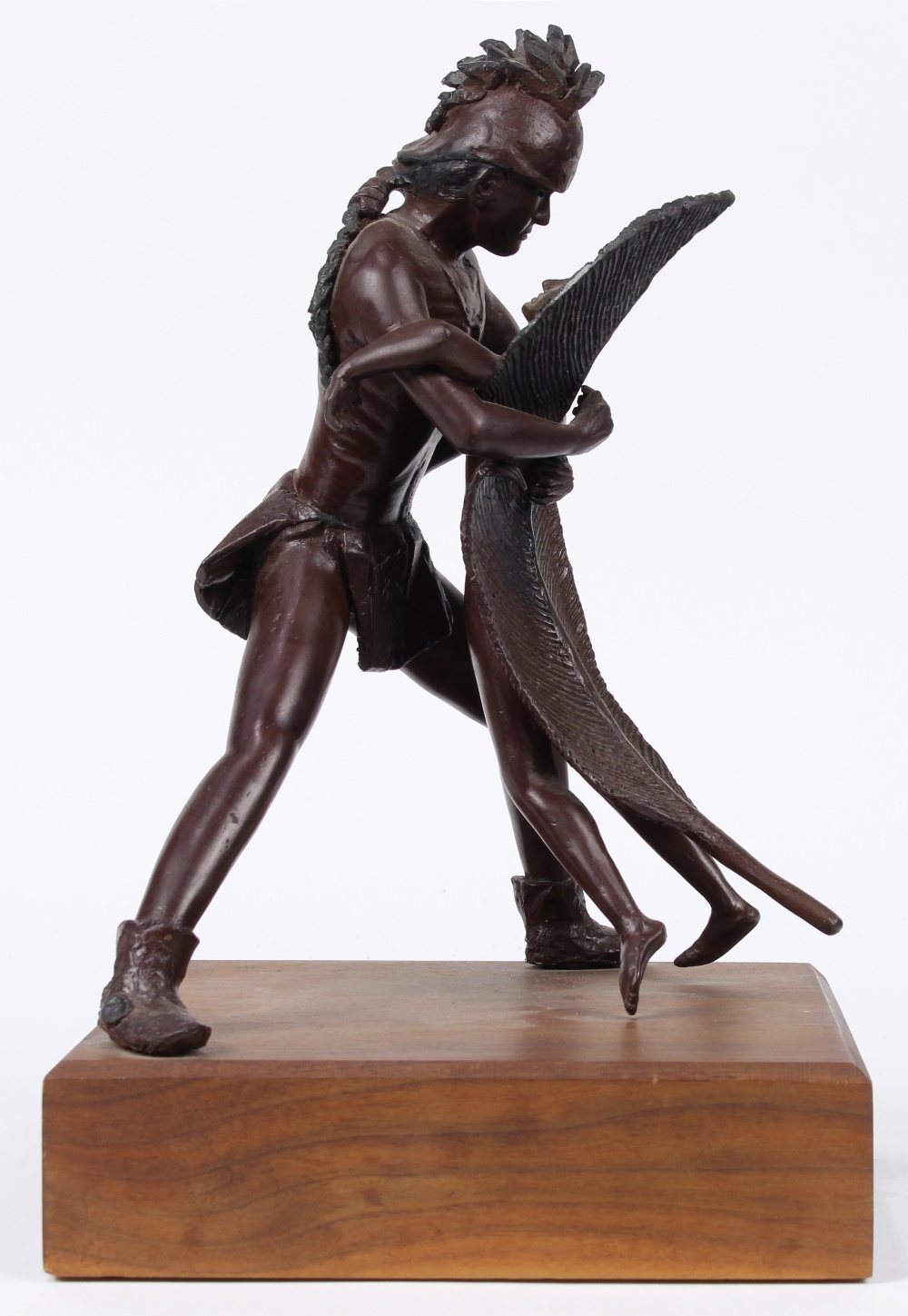 Patinated bronze Native American figure, modeled as embracing a feather girl, rising on a wood base, - Image 2 of 4