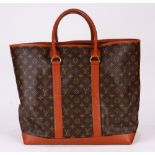 Vintage Louis Vuitton monogram tote, having two outer side pockets, interior zipper pocket, marked