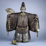 Japanese bronze and mixed metal noh dancer, in traditional attire with an Okina mask and holding a