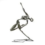 Contemporary silvered metal sculpture depicting a female in dance pose, her arm out stretched and