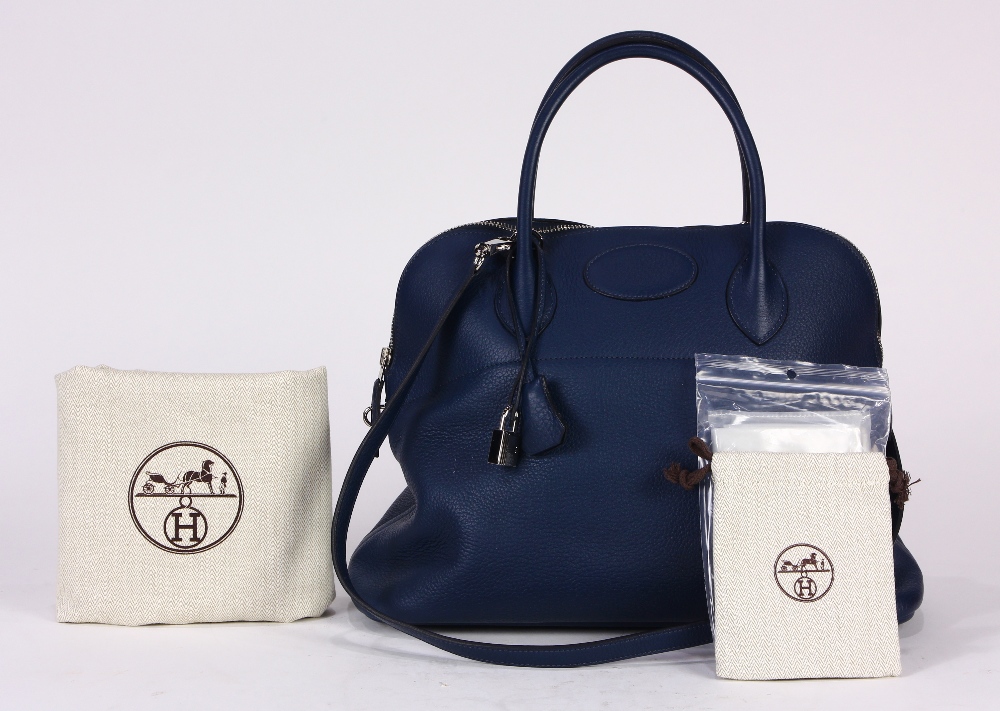 Hermes Clemence Bolide handbag, executed in navy, 35cm, with strap, lock, clochette, dust bag,