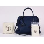 Hermes Clemence Bolide handbag, executed in navy, 35cm, with strap, lock, clochette, dust bag,