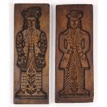 Pair of carved wood Swiss or German figural baking molds, 20.5"l x 7.5"w
