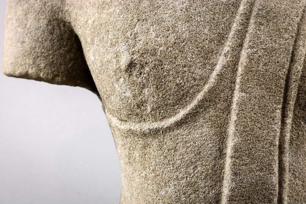 Thai sandstone torso, adorned in a simple monk's robe with fabric draping down the left shoulder, - Image 7 of 7