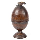 Patinated copper Etrog box, the hand hammered container having an egg form, bearing a Hebrew