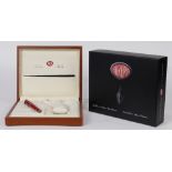 Italian Aurora limited edition pen, having a marbleized red case with silver mounts, retaining the